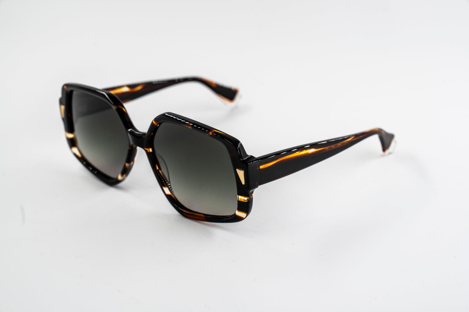 Occhiali da sole GIGI Studios OLIMPYA 6665/2 1192 cal.55 ponte 15 asta 137